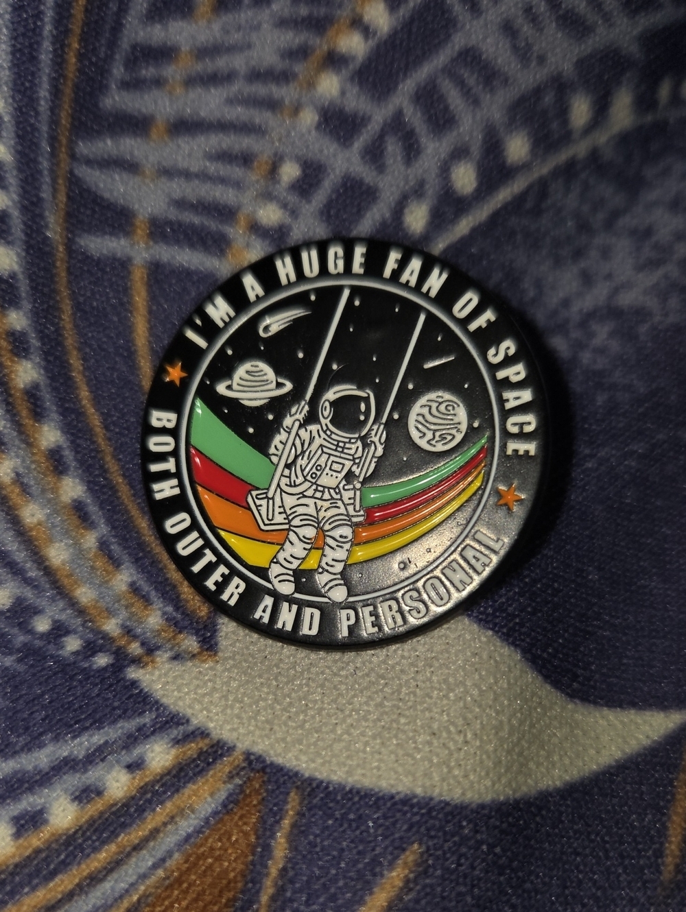 Space Fan Astronaut Enamel Pin — Black with Rainbow Stripes